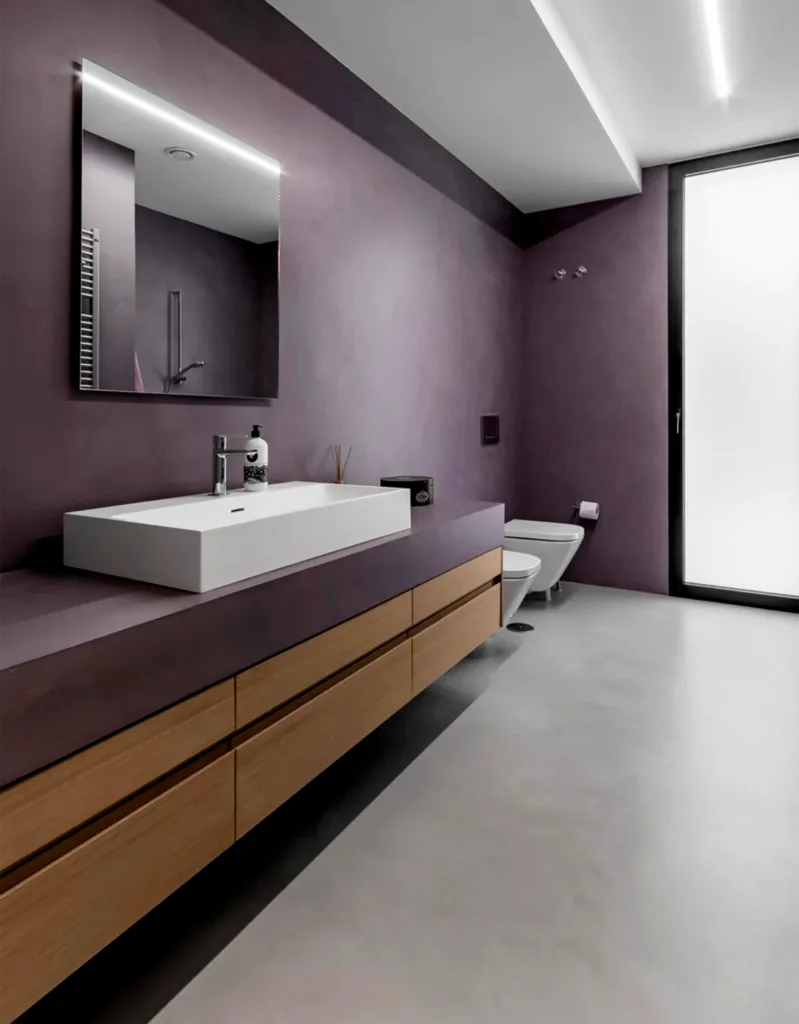 reformas integrales y aplicación de microcemento en suelo de baño moderno - suelo contininuo sin juntas